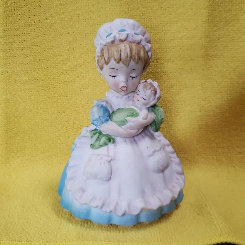 Vintage Porcelain Nursemaid and Baby Revolving Musical Figurine "Brahms Lullaby"